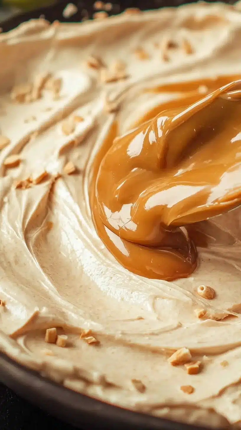 Delicious Caramel Cream Cheese Dip served with fruit and snacks