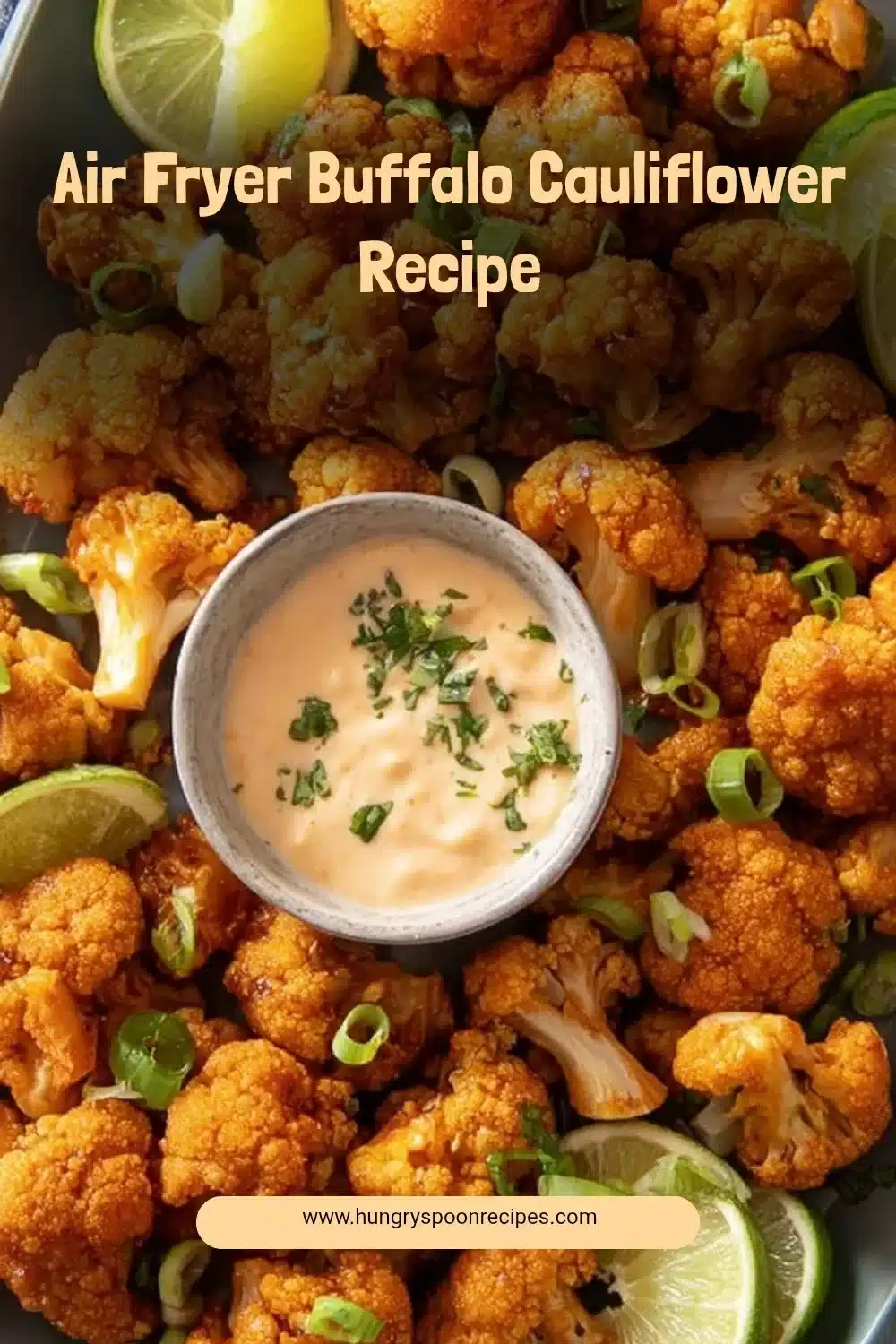 Air fryer buffalo cauliflower on a plate garnished with green onions