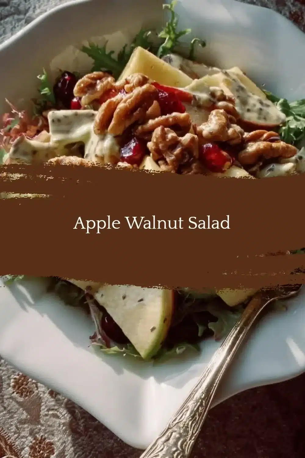 Fresh Apple Walnut Salad with greens and dressing, a healthy meal option.