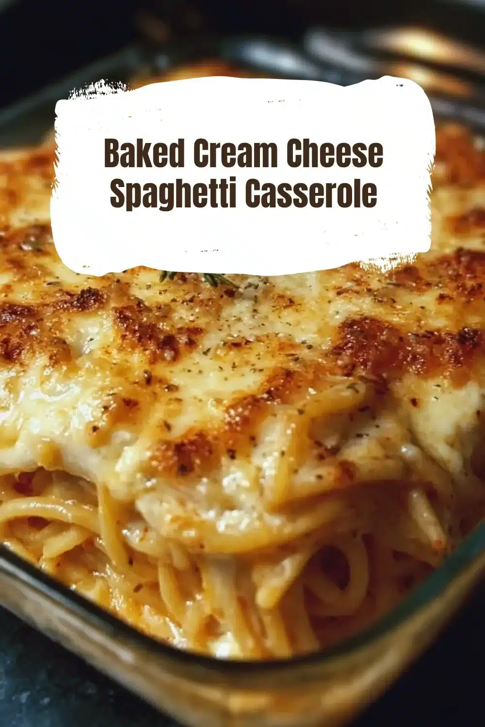 Baked Cream Cheese Spaghetti Casserole 1 Baked Cream Cheese Spaghetti Casserole topped with cheese and herbs
