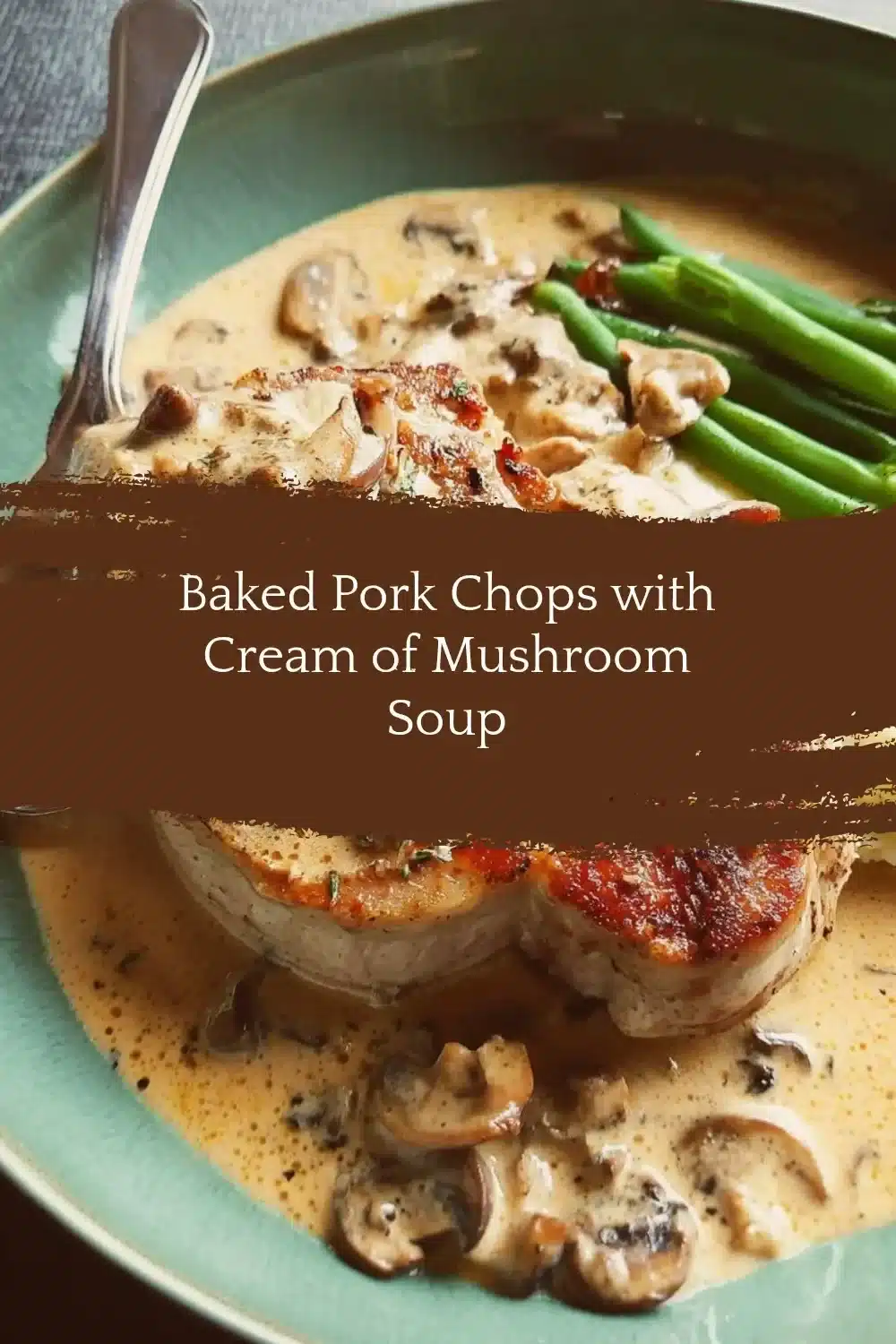 Baked pork chops topped with creamy mushroom soup on a plate