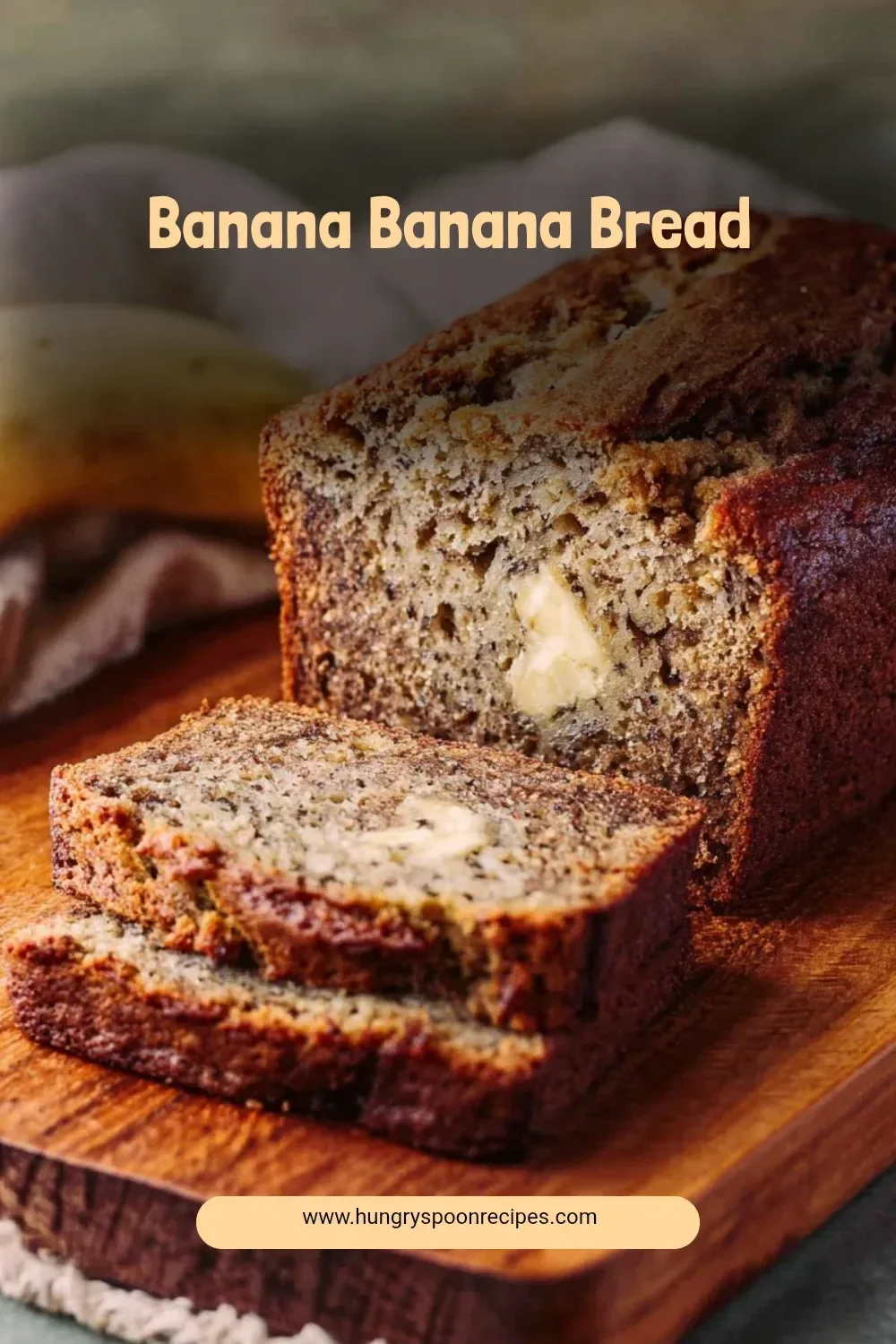 Deliciously moist Banana Banana Bread topped with walnuts