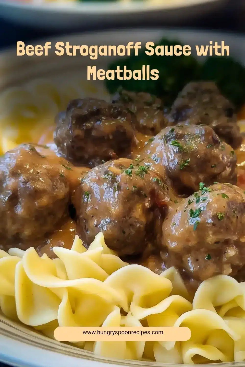Beef Stroganoff sauce with meatballs served over noodles
