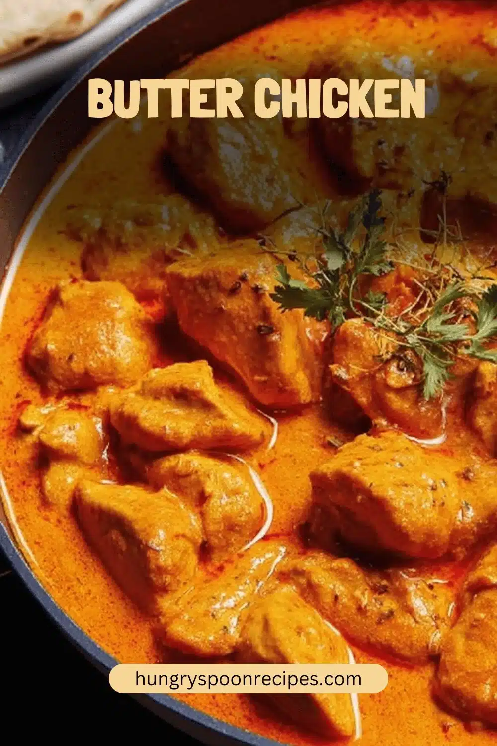 Delicious butter chicken served with rice and naan, showcasing vibrant curry colors.