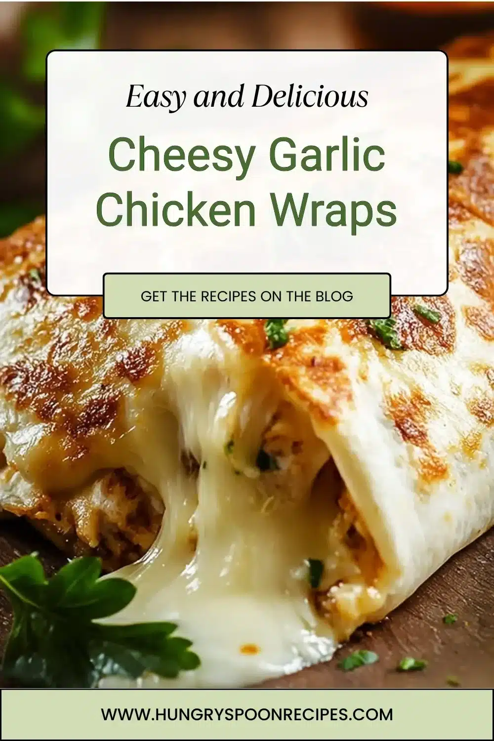 Cheesy Garlic Chicken Wraps garnished with fresh herbs and served on a plate.