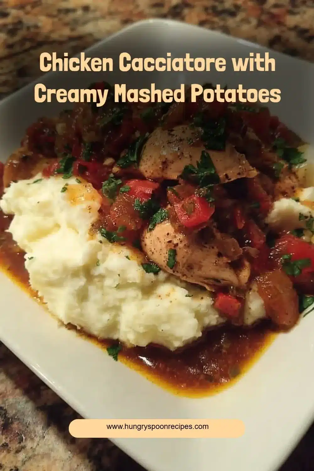 Plate of Chicken Cacciatore with creamy mashed potatoes and fresh herbs