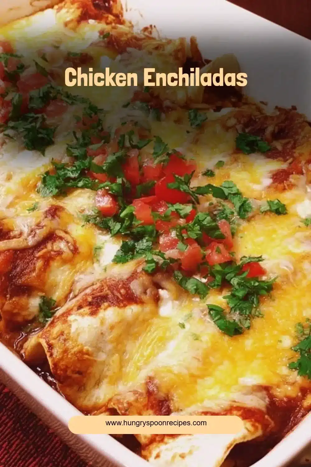 Serving of Chicken Enchiladas topped with sauce and garnished with fresh cilantro.