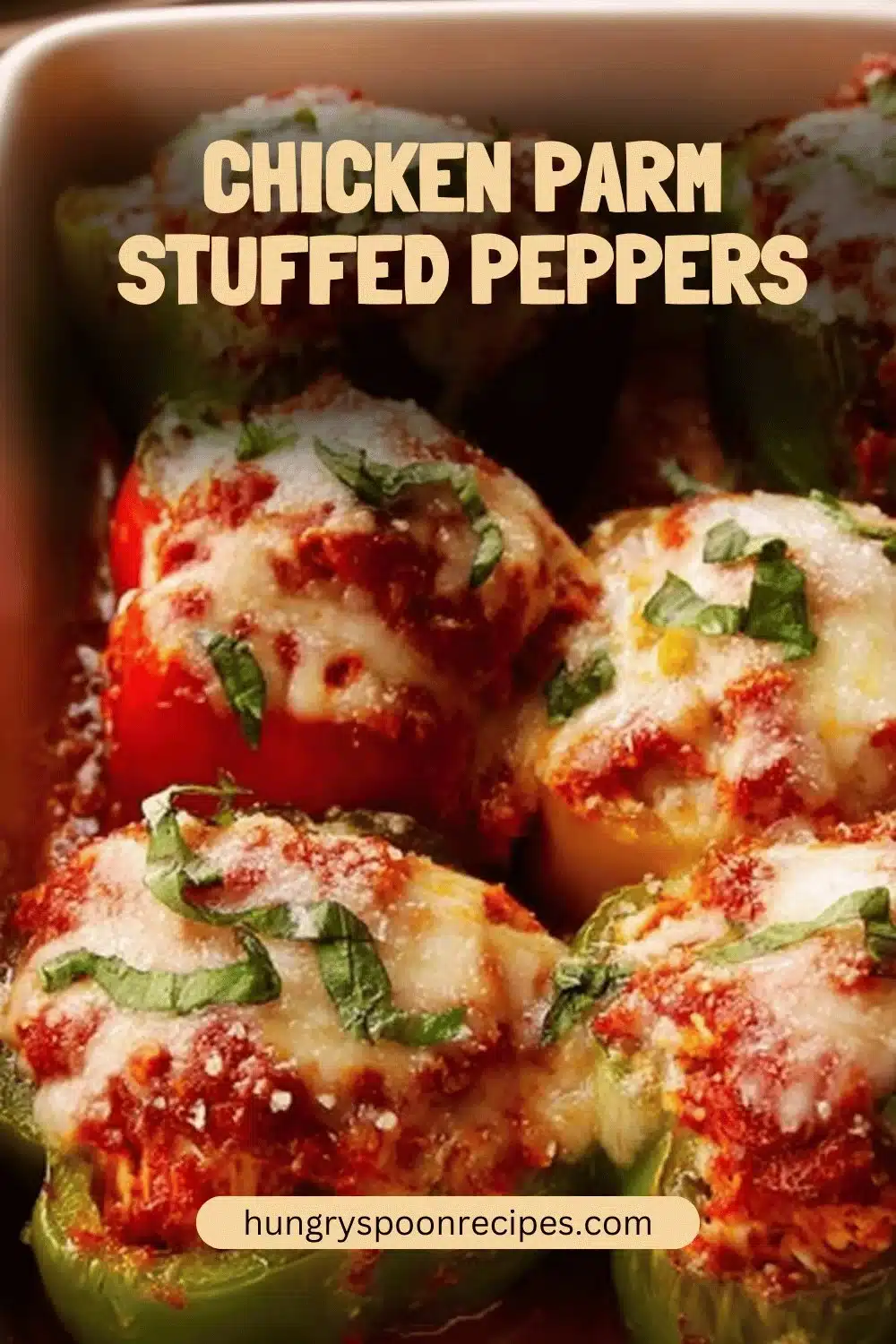 Delicious Chicken Parm stuffed peppers with melted cheese and marinara sauce