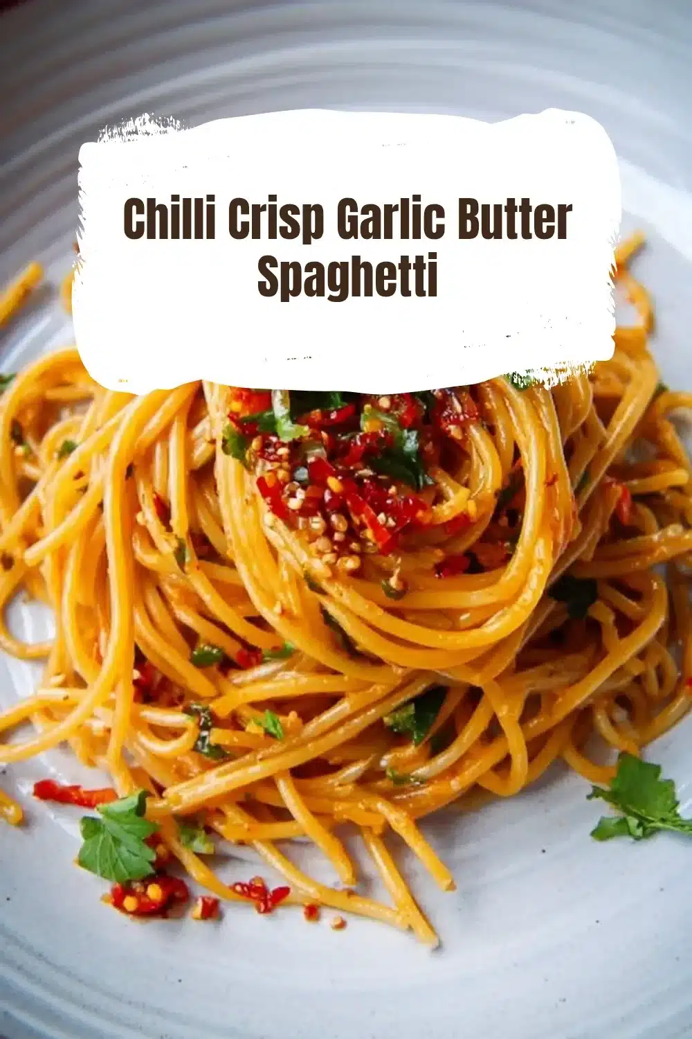 Chilli Crisp Garlic Butter Spaghetti topped with spicy garlic and crispy chilli flakes