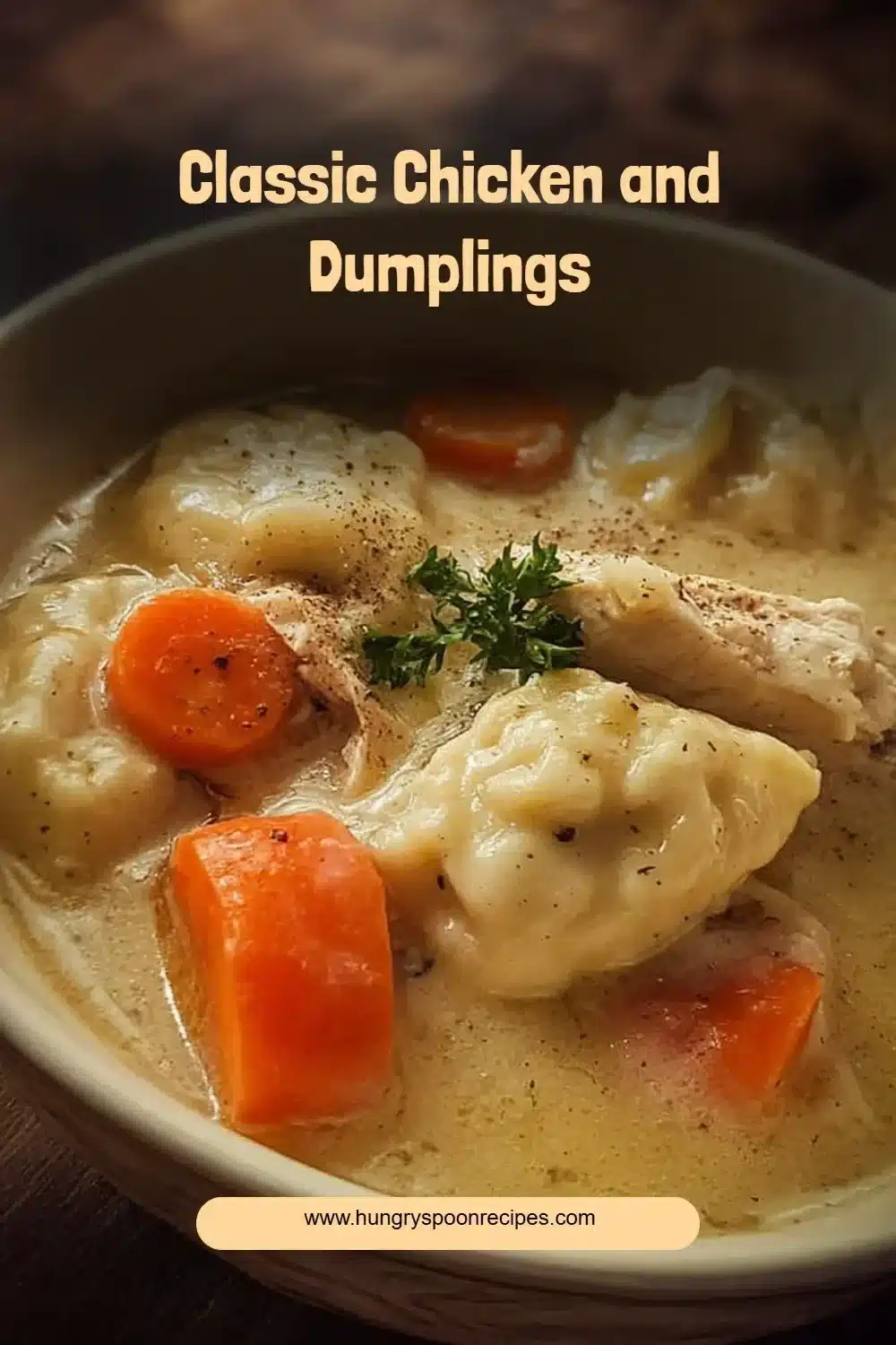 Bowl of classic chicken and dumplings served with fresh herbs