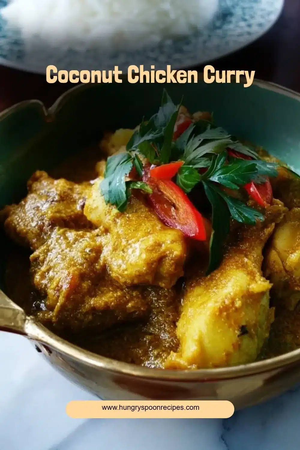 Coconut Chicken Curry 1 Delicious Coconut Chicken Curry served in a bowl with fresh herbs.