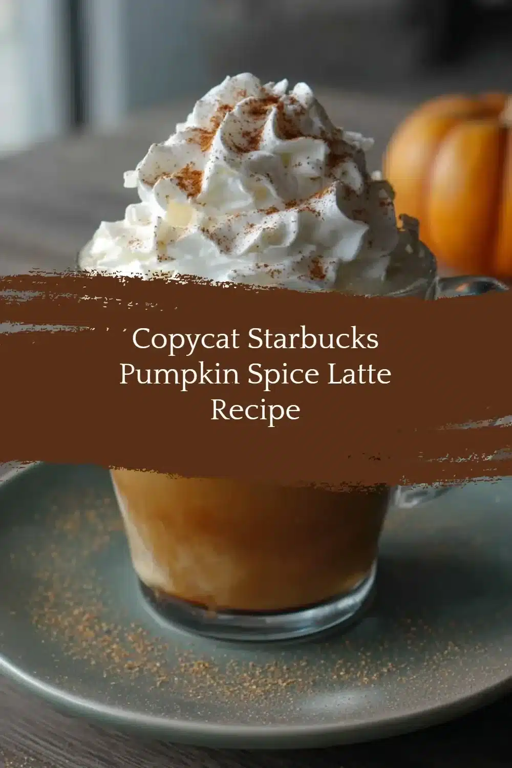 Homemade Pumpkin Spice Latte in a cozy mug with autumn decor