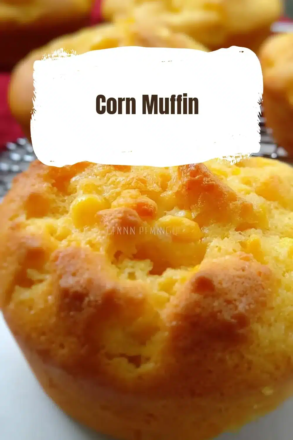Corn Muffin 1 Freshly baked corn muffins on a wooden table
