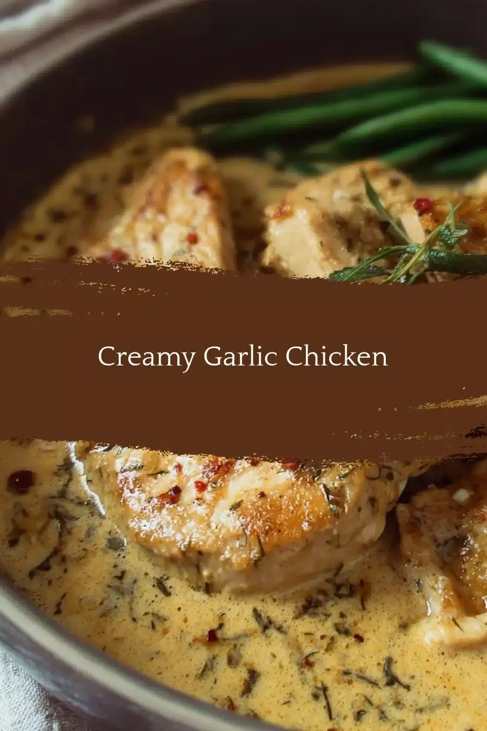 Creamy Garlic Chicken 1 Creamy garlic chicken dish garnished with herbs on a plate