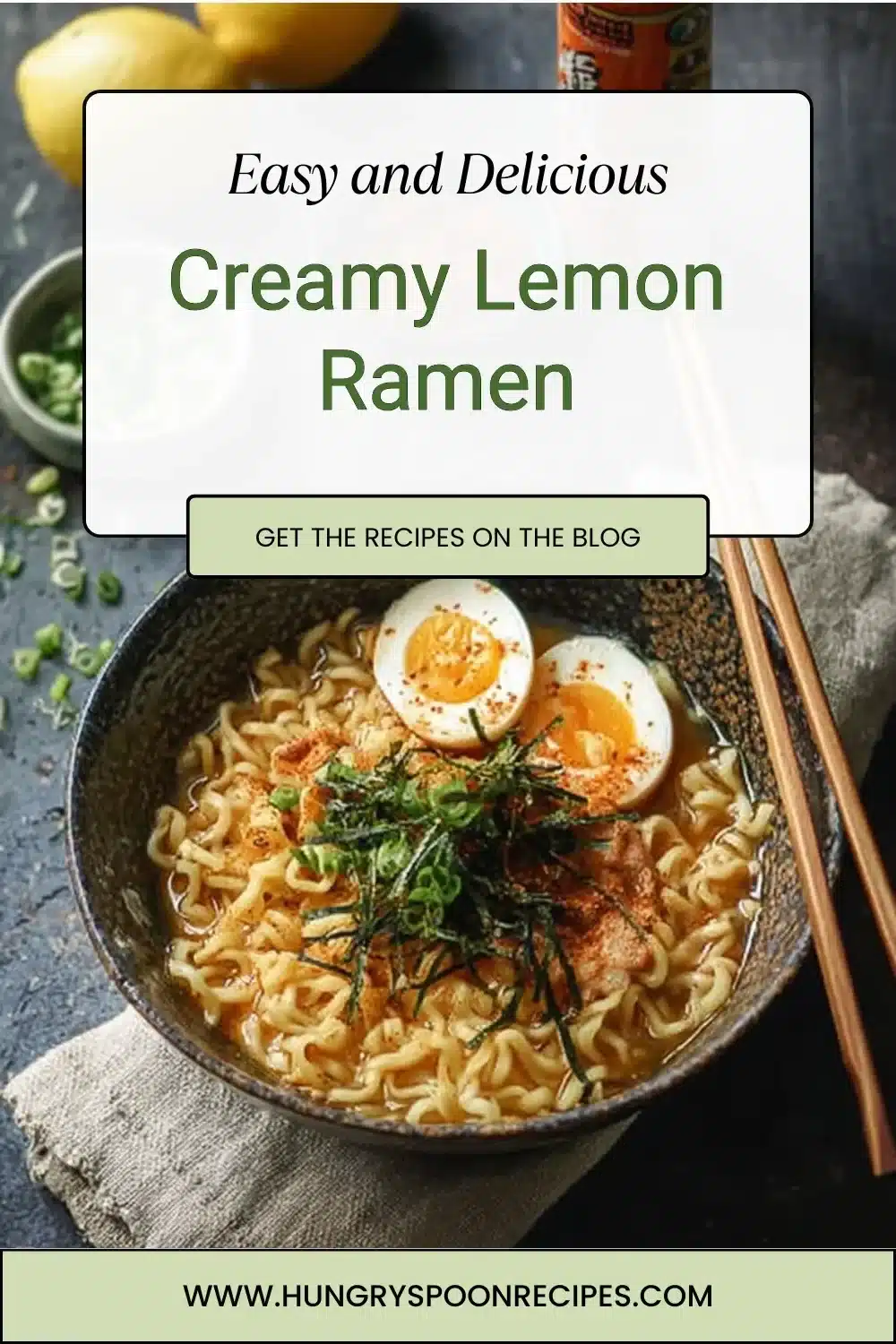 A bowl of creamy lemon ramen garnished with fresh herbs and lemon slices.