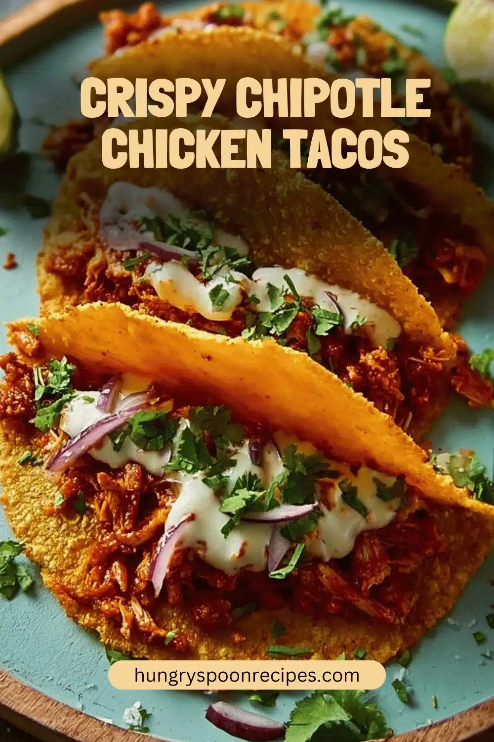 Crispy Chipotle Chicken Tacos 1 Crispy chipotle chicken tacos served with fresh toppings on a plate