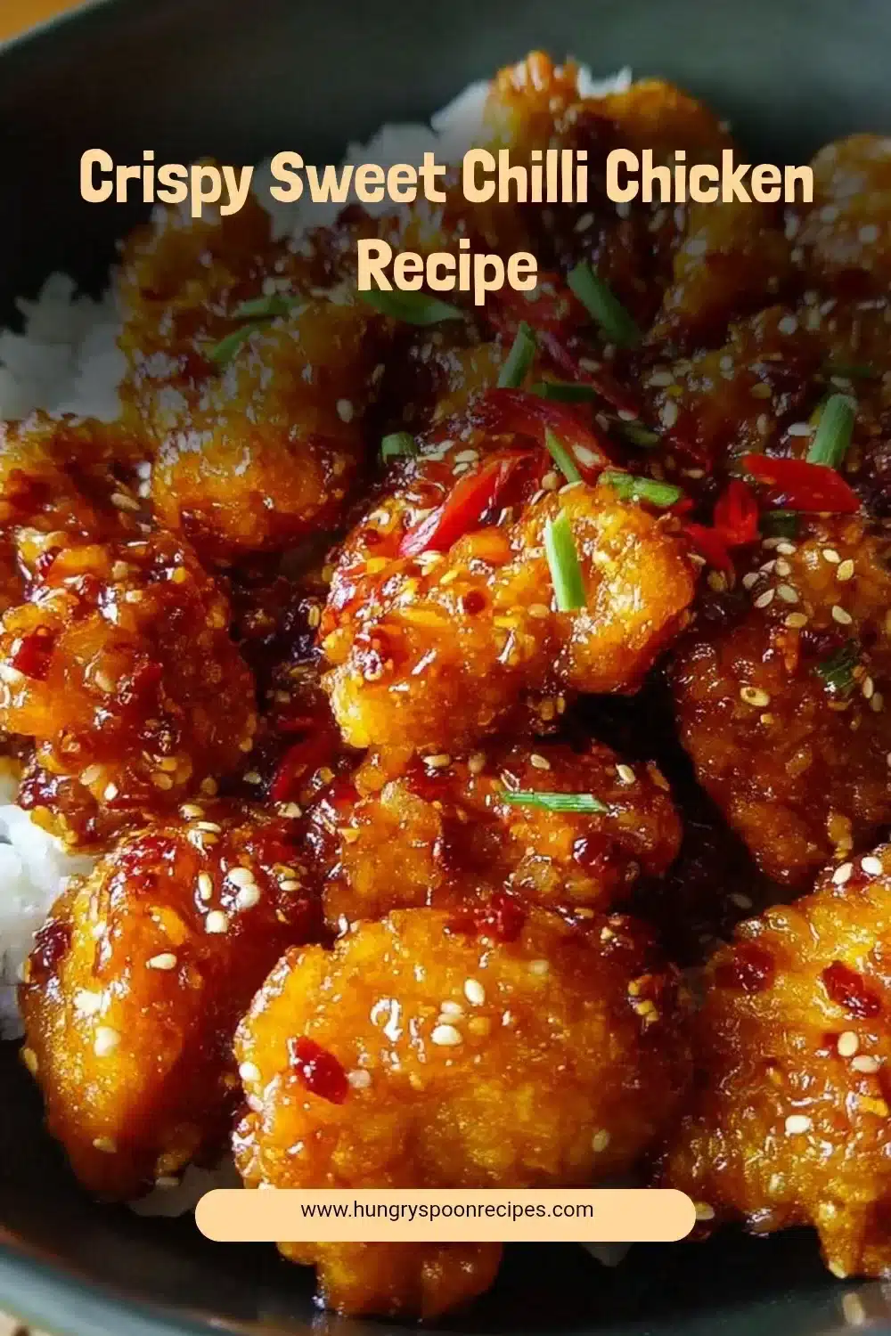 Crispy Sweet Chilli Chicken Recipe 1 Crispy sweet chilli chicken served on a plate with dipping sauce.