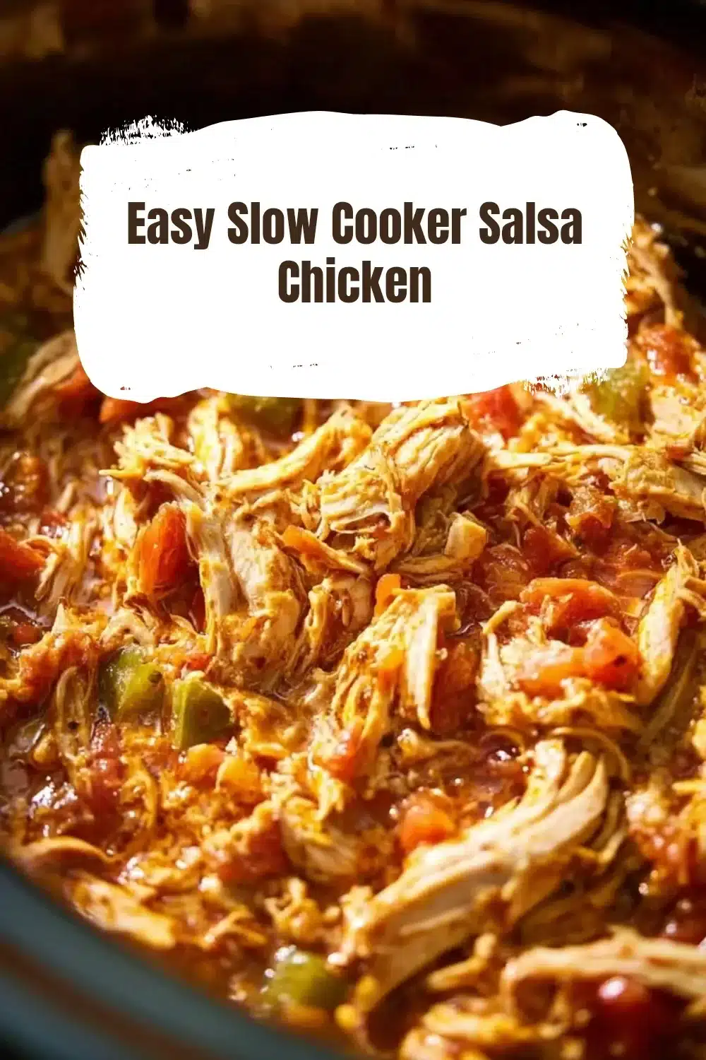 Bowl of easy slow cooker salsa chicken served with rice and garnished with cilantro