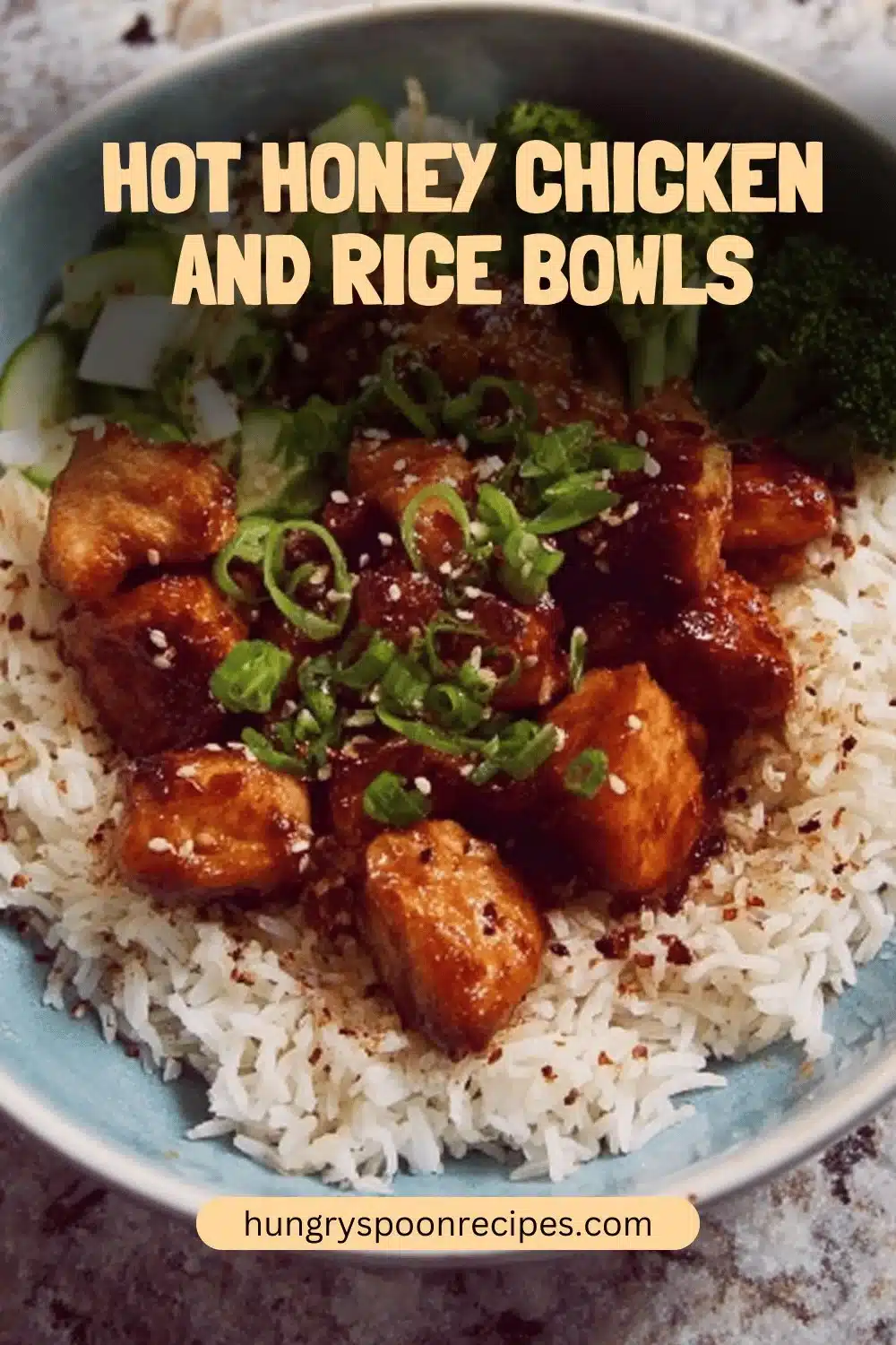 Hot Honey Chicken served in a rice bowl with vegetables