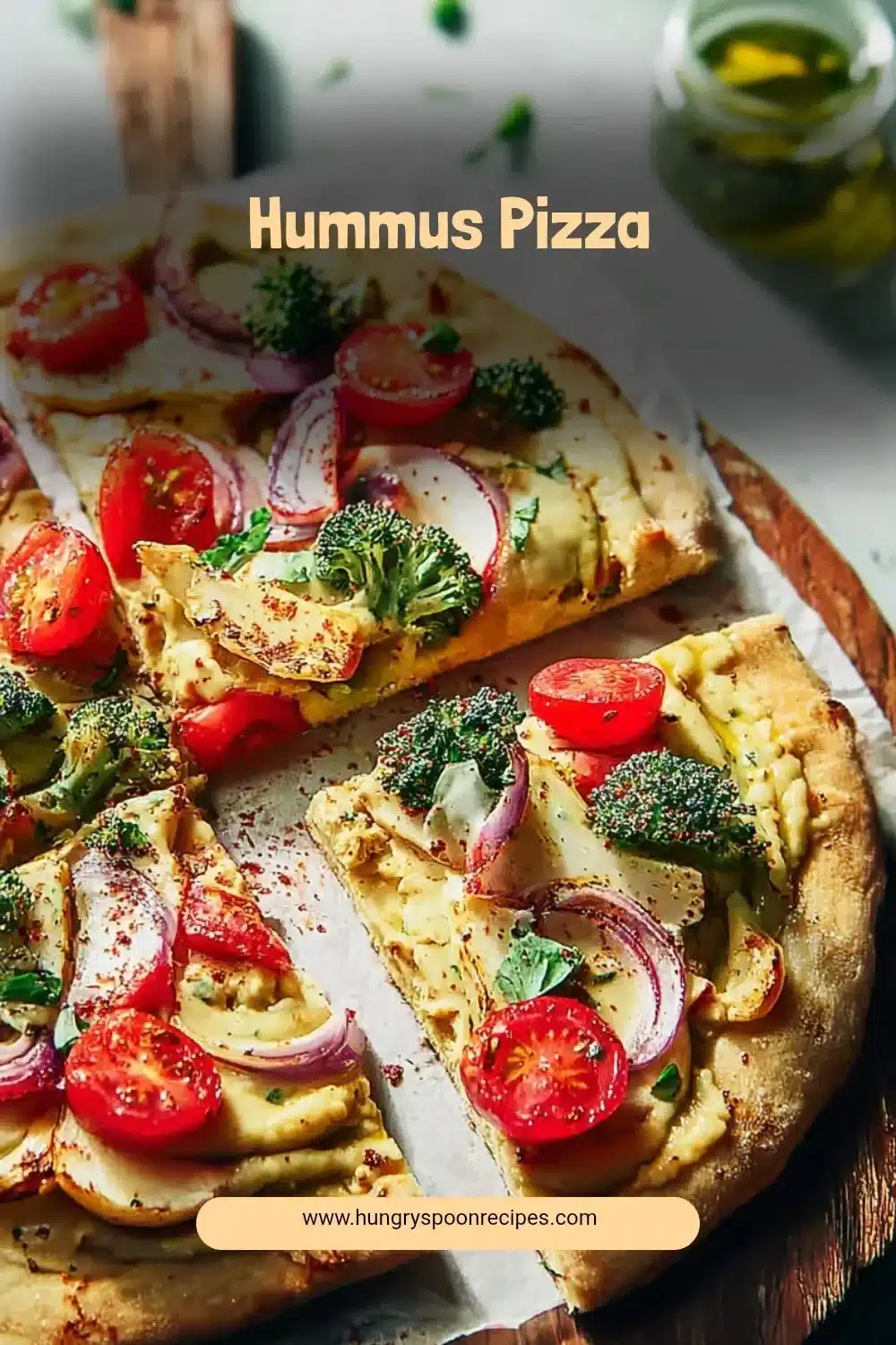 Hummus Pizza 1 Delicious Hummus Pizza topped with fresh vegetables and herbs