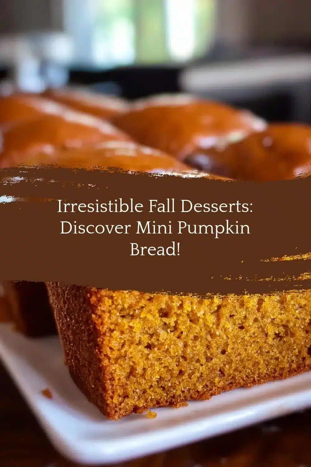 Delicious mini pumpkin bread loaves decorated with fall spices and nuts.