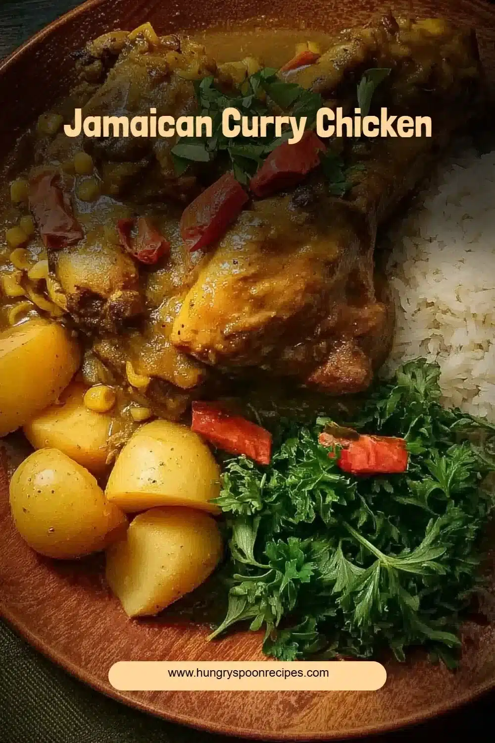 Delicious Jamaican Curry Chicken served on a plate with rice and vegetables