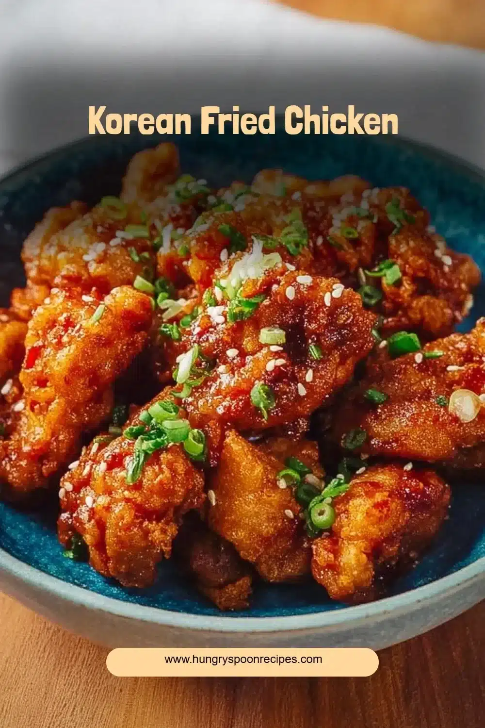 Korean Fried Chicken 1 Plate of crispy Korean Fried Chicken with dipping sauce and side dishes.