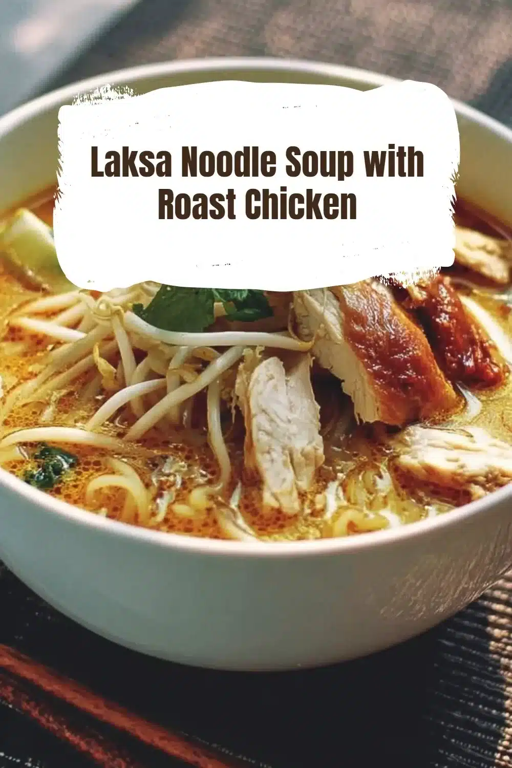 Laksa Noodle Soup with Roast Chicken 1 Bowl of Laksa Noodle Soup topped with tender roast chicken and garnished with herbs.