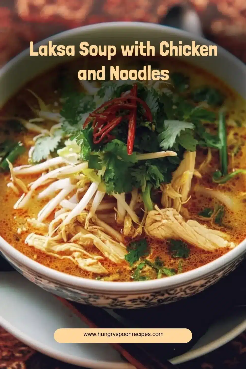 Delicious Laksa Soup with Chicken and Noodles, showcasing vibrant colors and toppings.