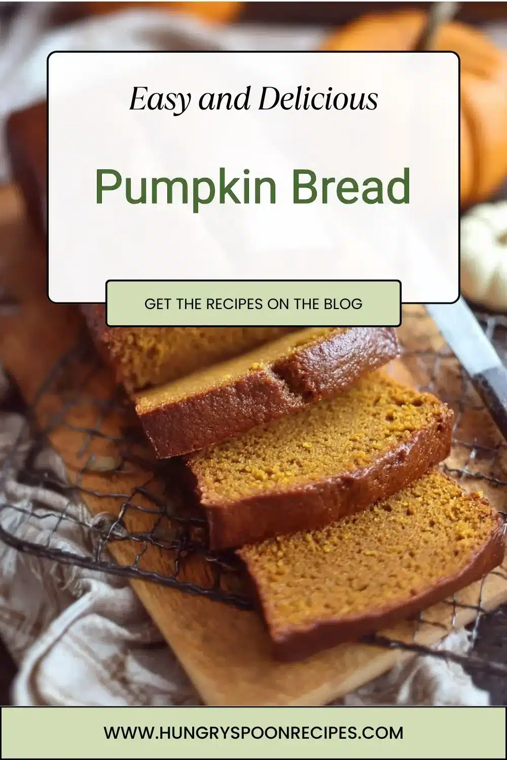 Loaf of freshly baked pumpkin bread topped with pumpkin seeds