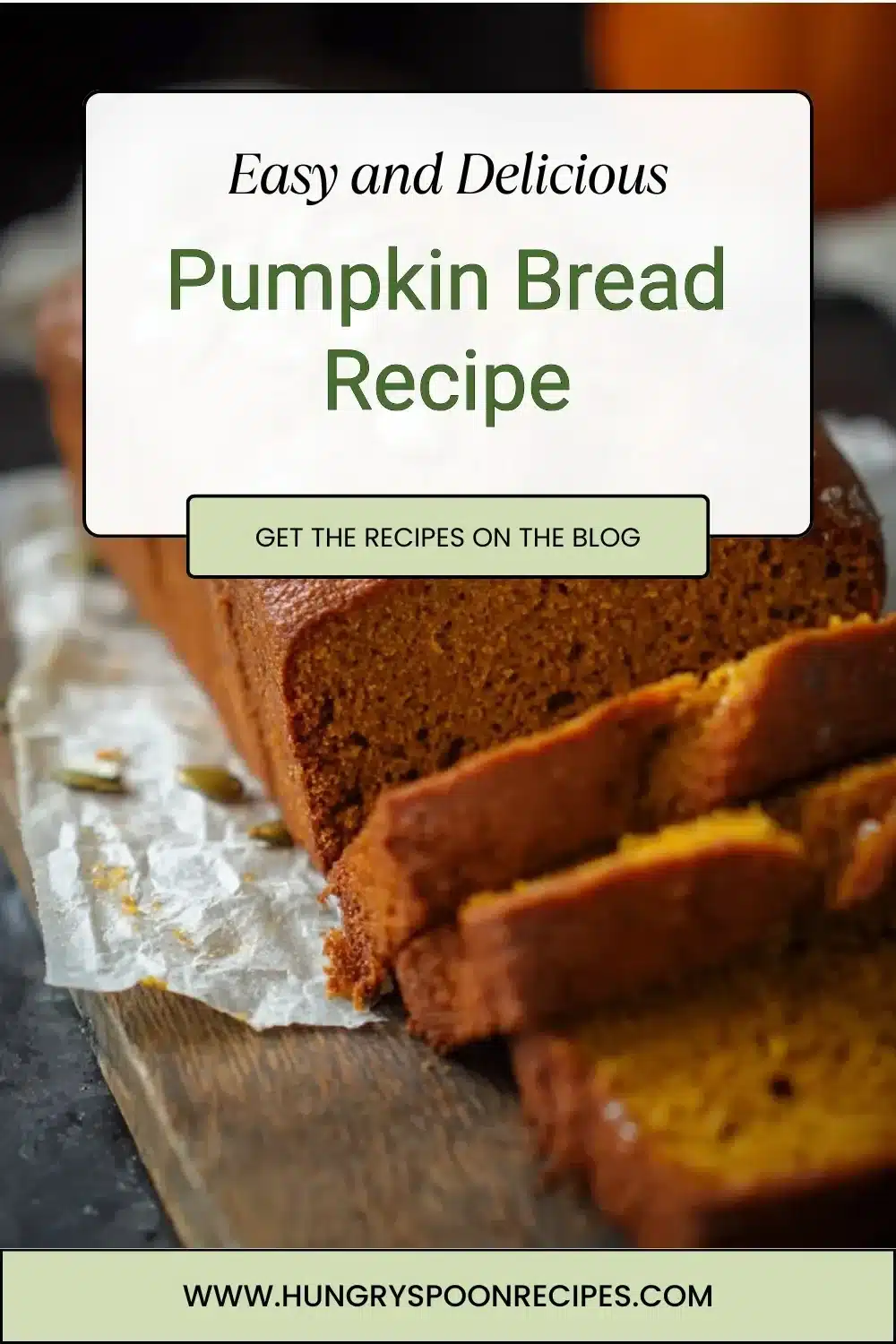 Delicious homemade pumpkin bread sliced and served on a wooden board