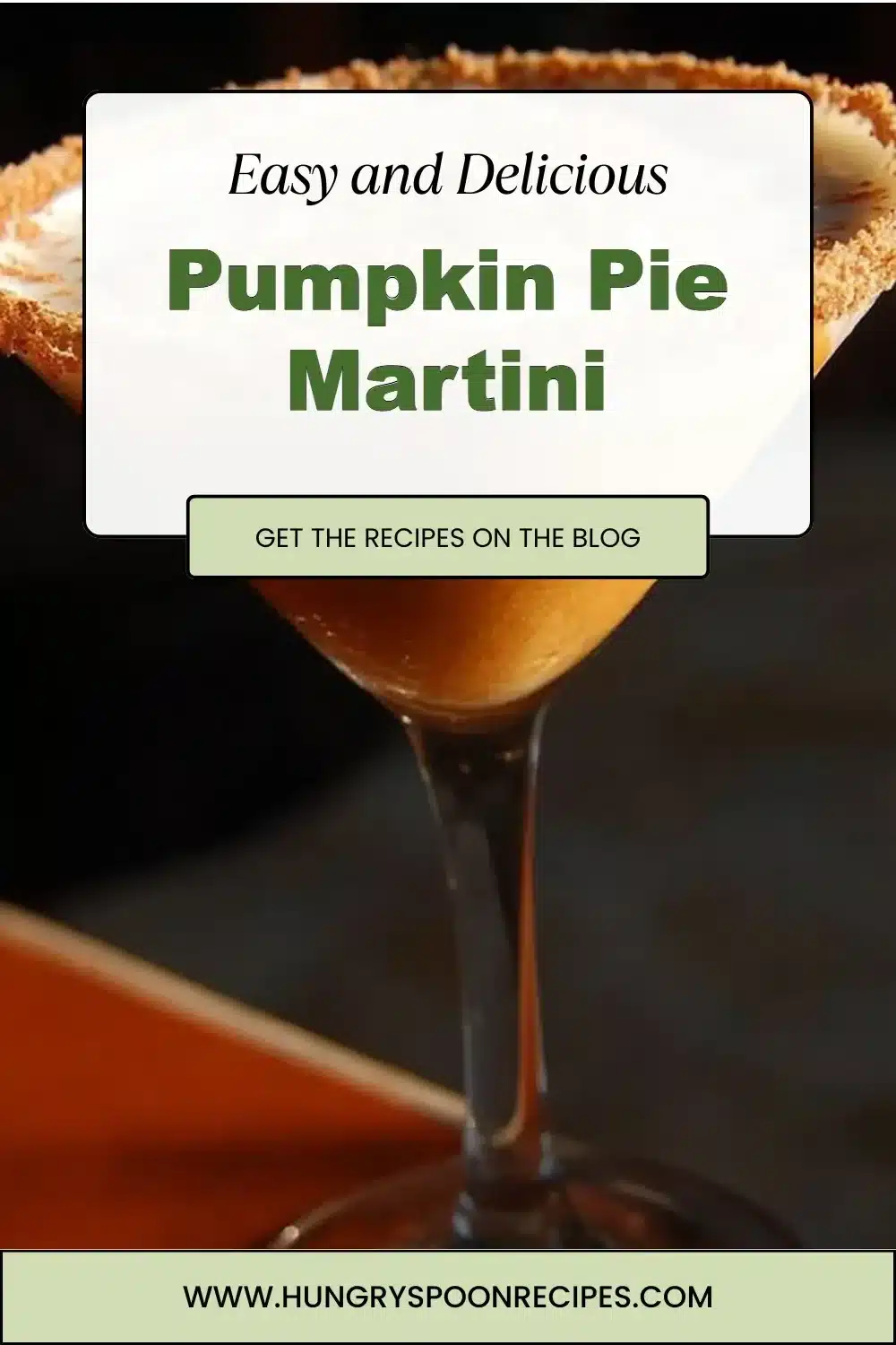 Delicious Pumpkin Pie Martini garnished with whipped cream and pumpkin spice.
