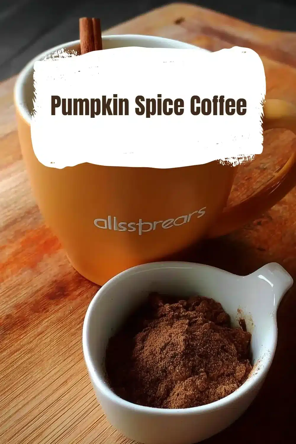 Pumpkin Spice Coffee 1 A warm cup of Pumpkin Spice Coffee with autumn leaves in the background