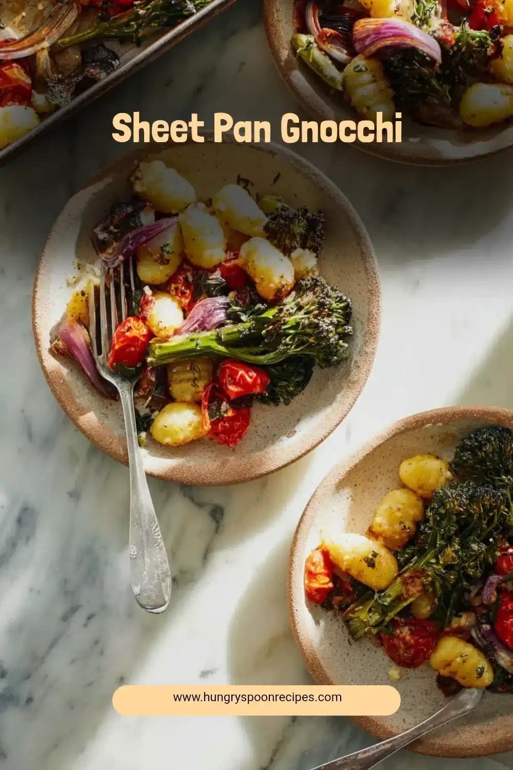 Delicious sheet pan gnocchi with vegetables baked on a tray.