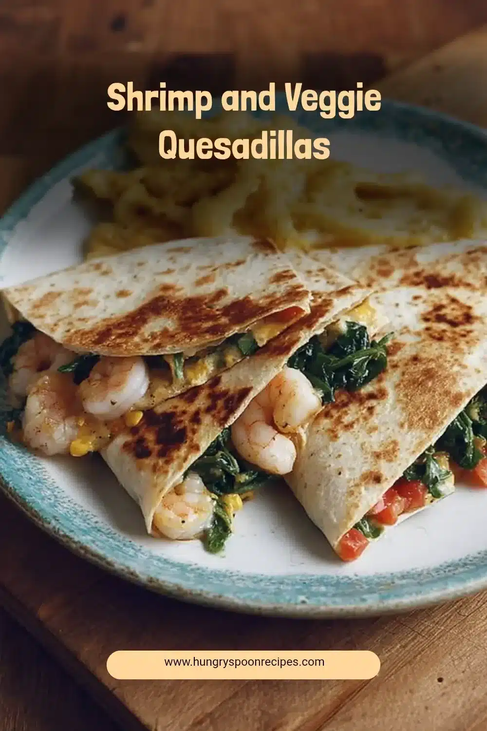 Shrimp and veggie quesadilla served with salsa and sour cream.