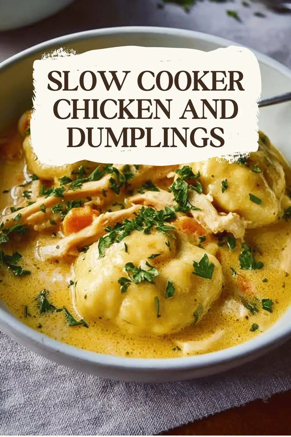 Bowl of slow cooker chicken and dumplings with fresh herbs