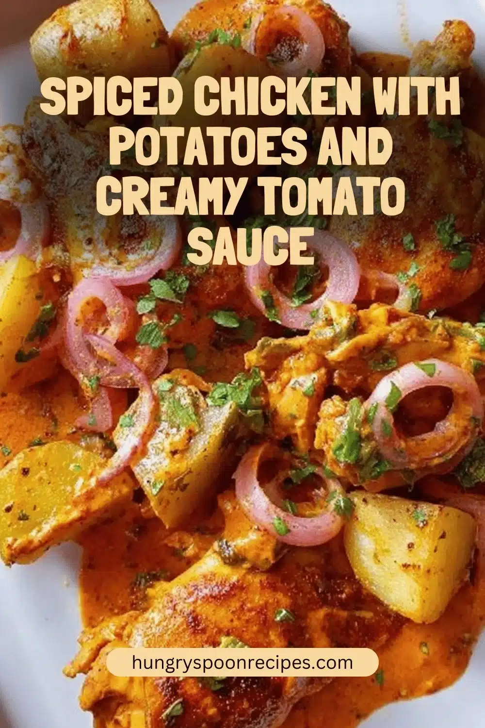 Spiced Chicken with Potatoes and Creamy Tomato Sauce 1 Spiced chicken served with potatoes in creamy tomato sauce