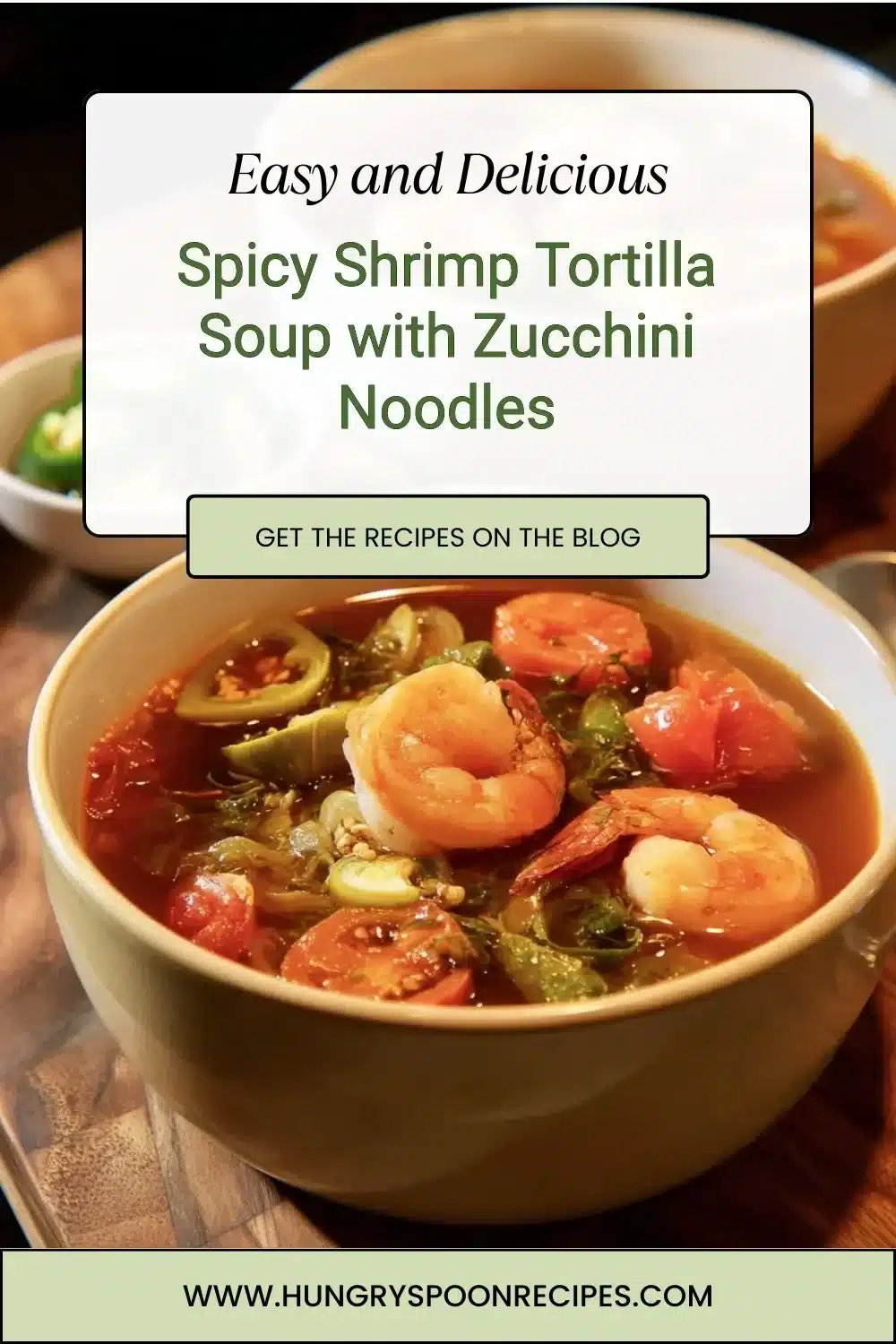 Bowl of spicy shrimp tortilla soup with zucchini noodles and fresh garnishes