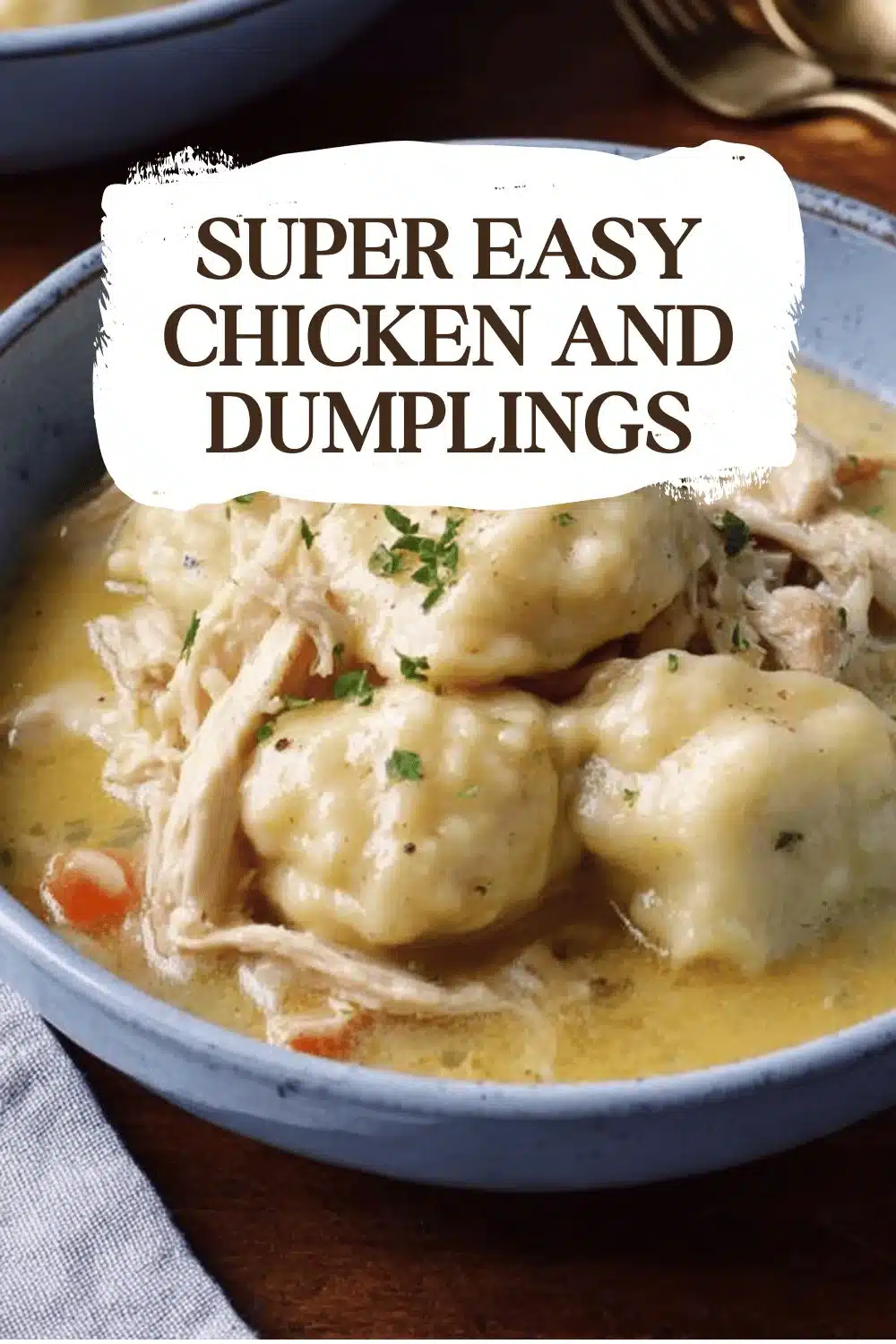 Bowl of super easy chicken and dumplings topped with herbs and spices