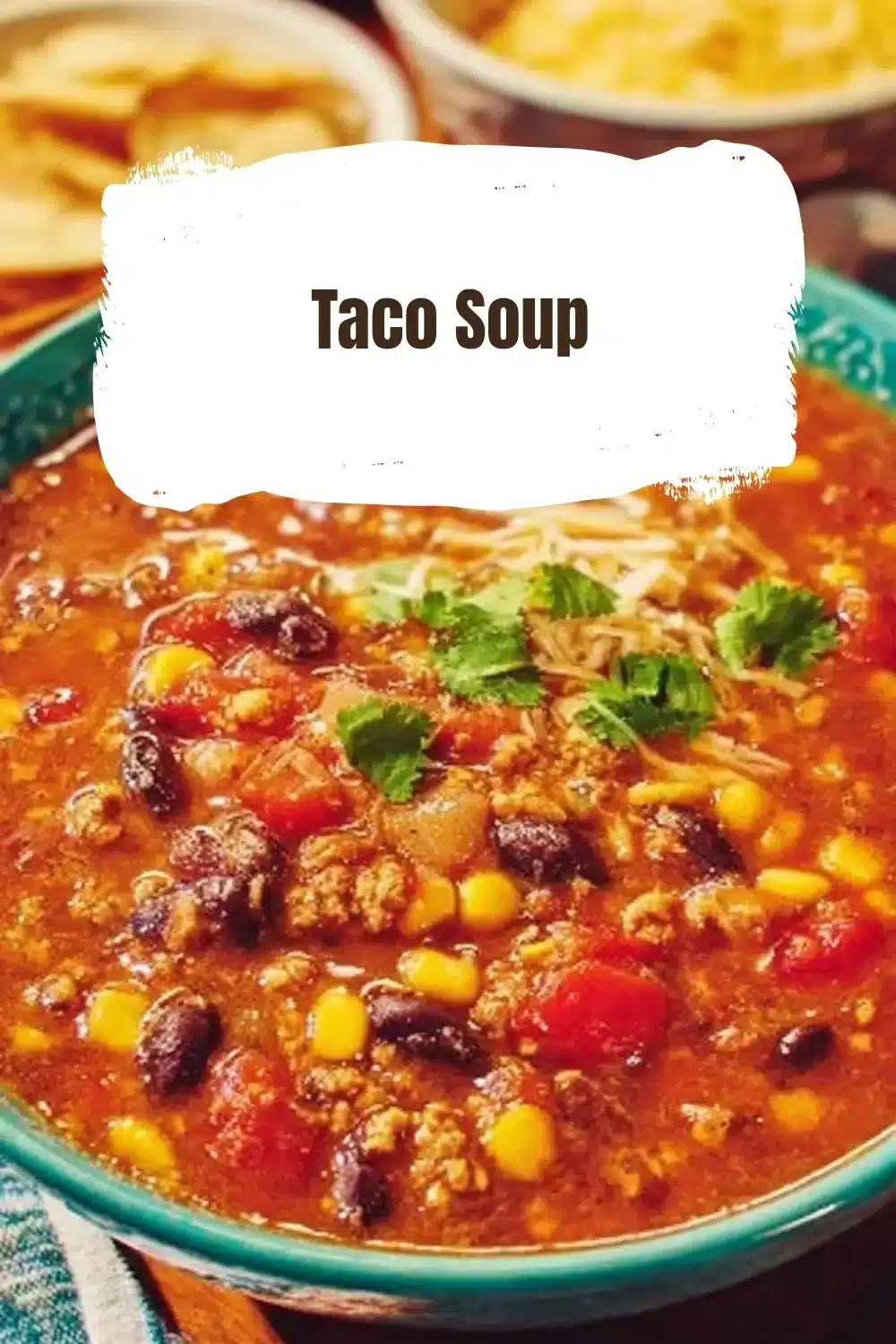 Delicious bowl of Taco Soup topped with cheese and cilantro