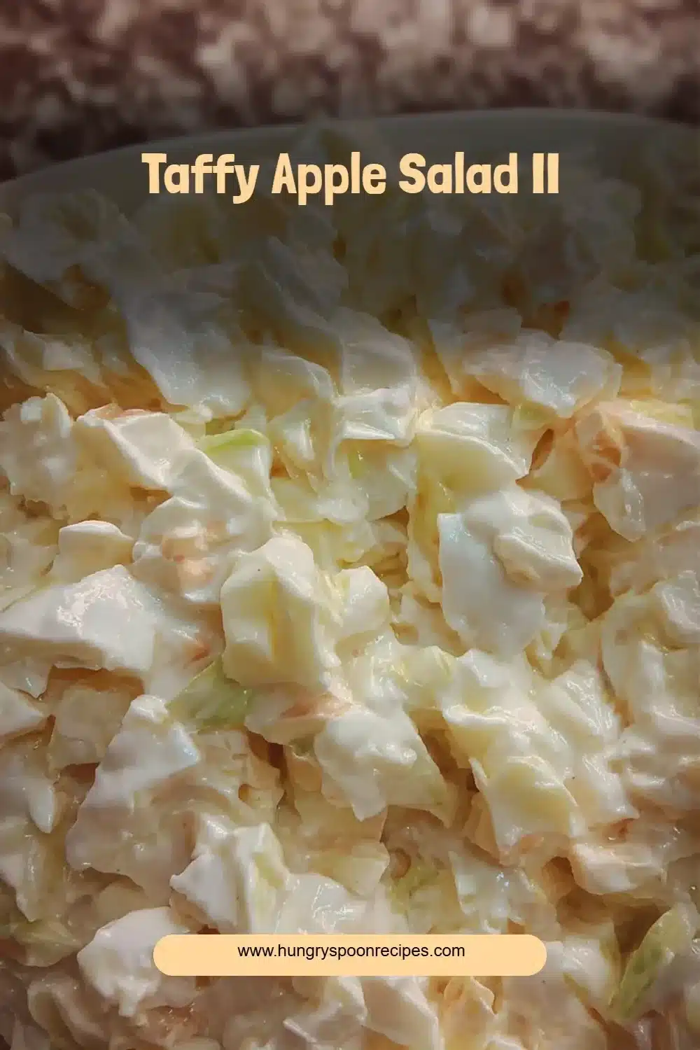 Delicious Taffy Apple Salad II with apples, candy, and creamy dressing