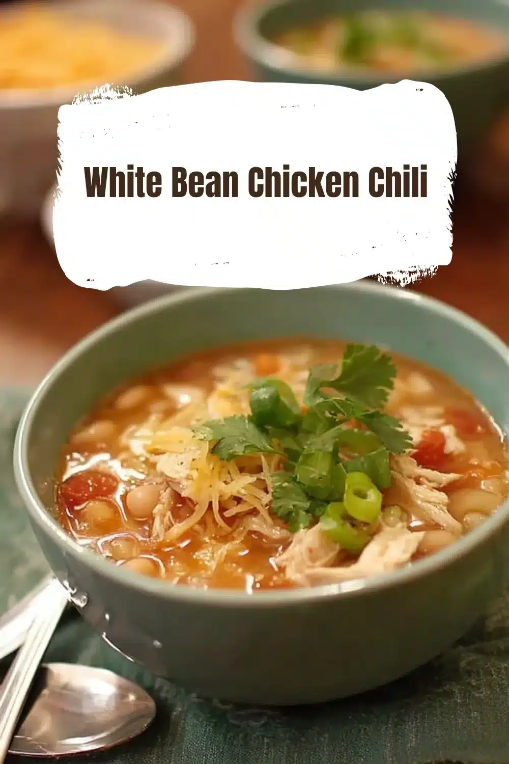 White Bean Chicken Chili 1 Delicious bowl of White Bean Chicken Chili with fresh herbs and toppings