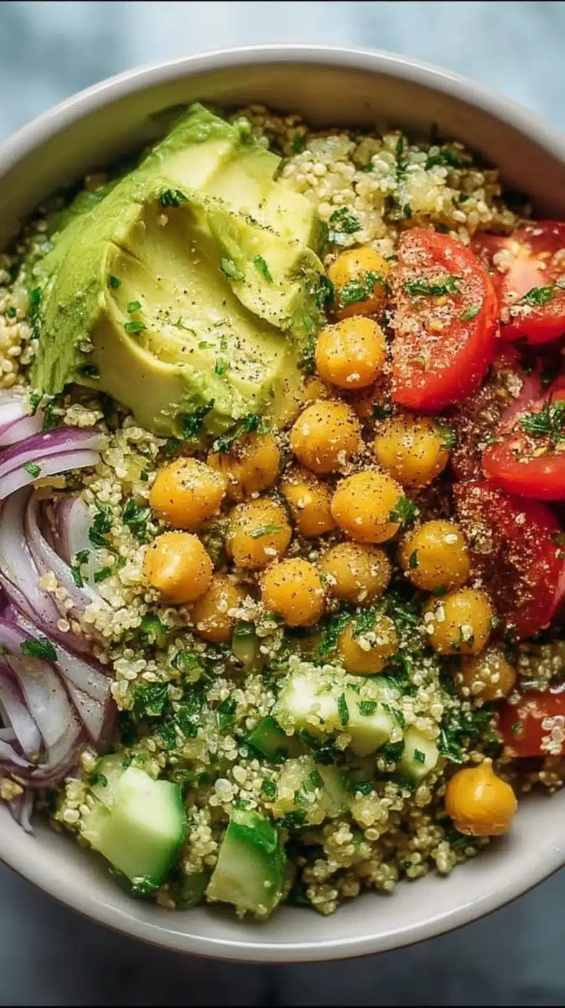 Chickpea Avocado Quinoa Bowl 1 Chickpea Avocado Quinoa Bowl with fresh vegetables and spices