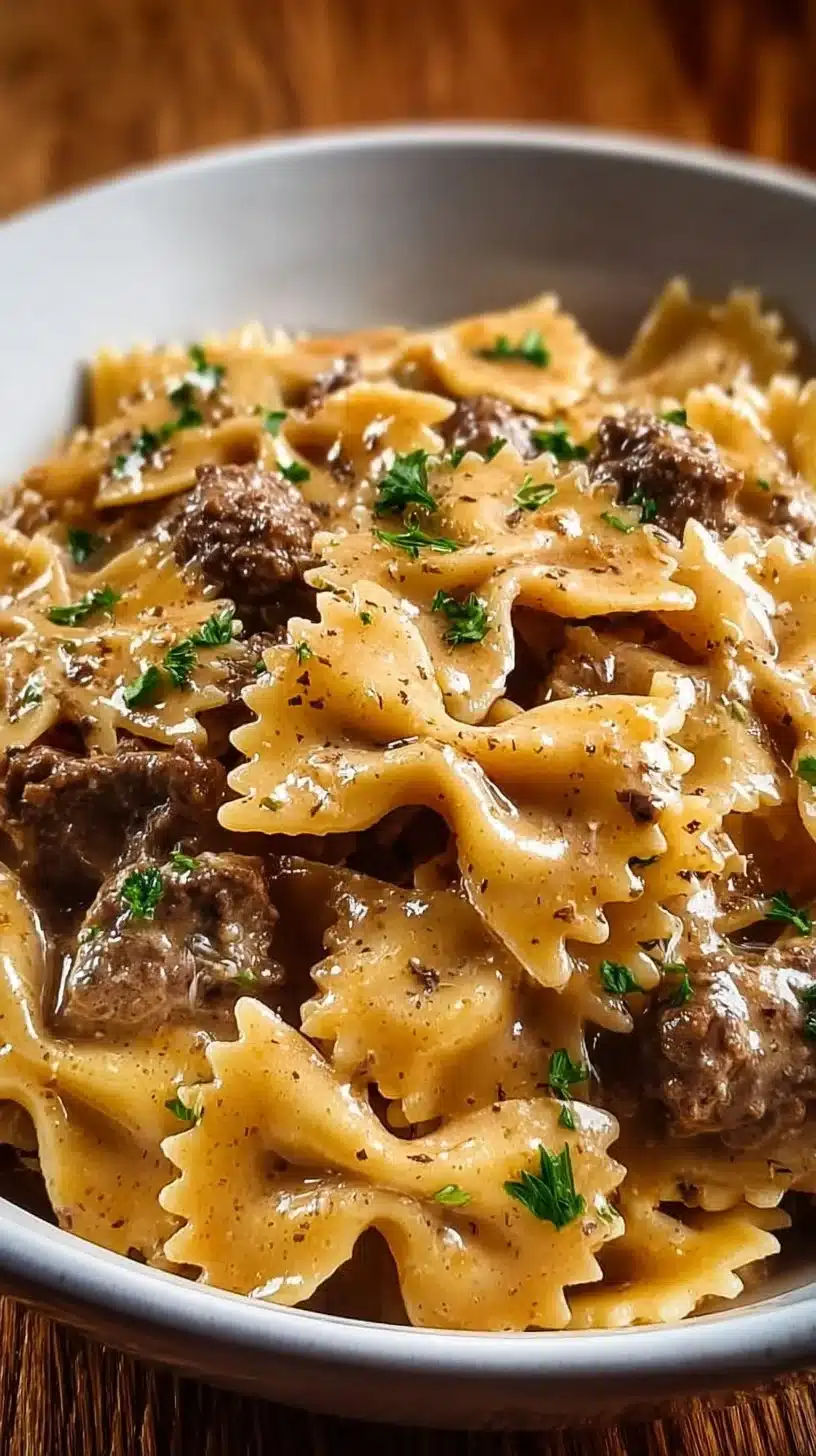 Creamy Parmesan Garlic Beef Bowtie Pasta 1 Creamy Parmesan Garlic Beef Bowtie Pasta served in a bowl