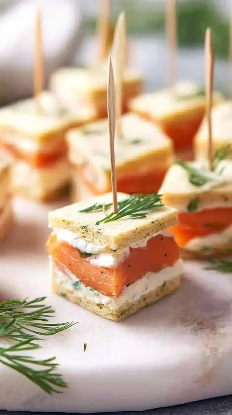 Smoked Salmon Bites 1 Platter of smoked salmon bites garnished with herbs and lemon slices