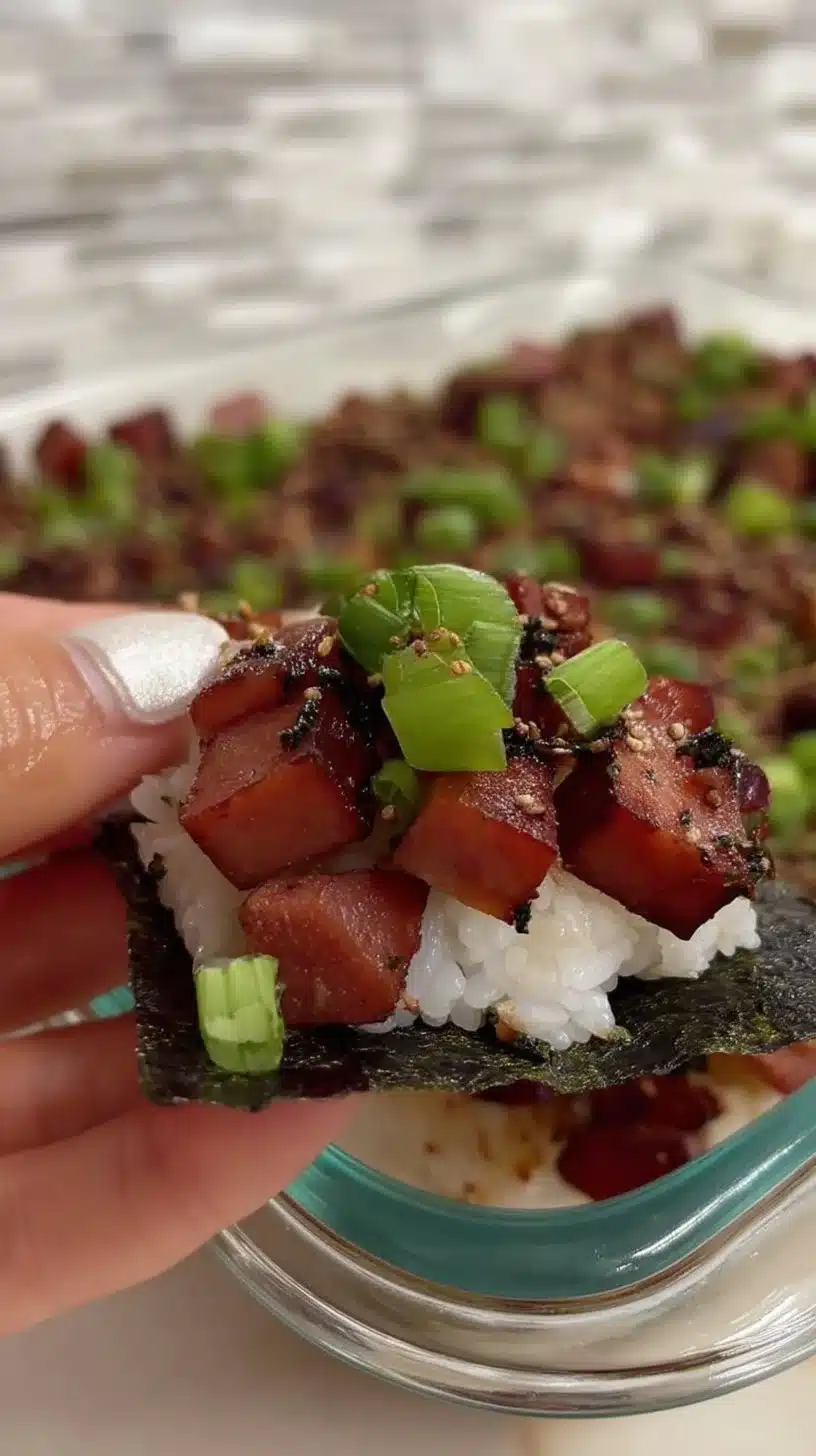 Delicious Spam Musubi Bake served on a plate with garnish.