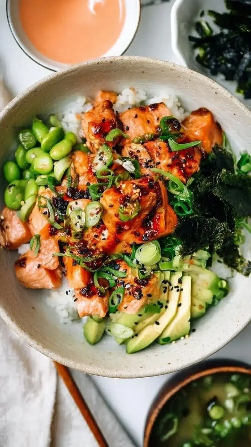 Spicy Salmon Sushi Rice Bowl 1 Spicy salmon sushi rice bowl with fresh ingredients and vibrant colors.