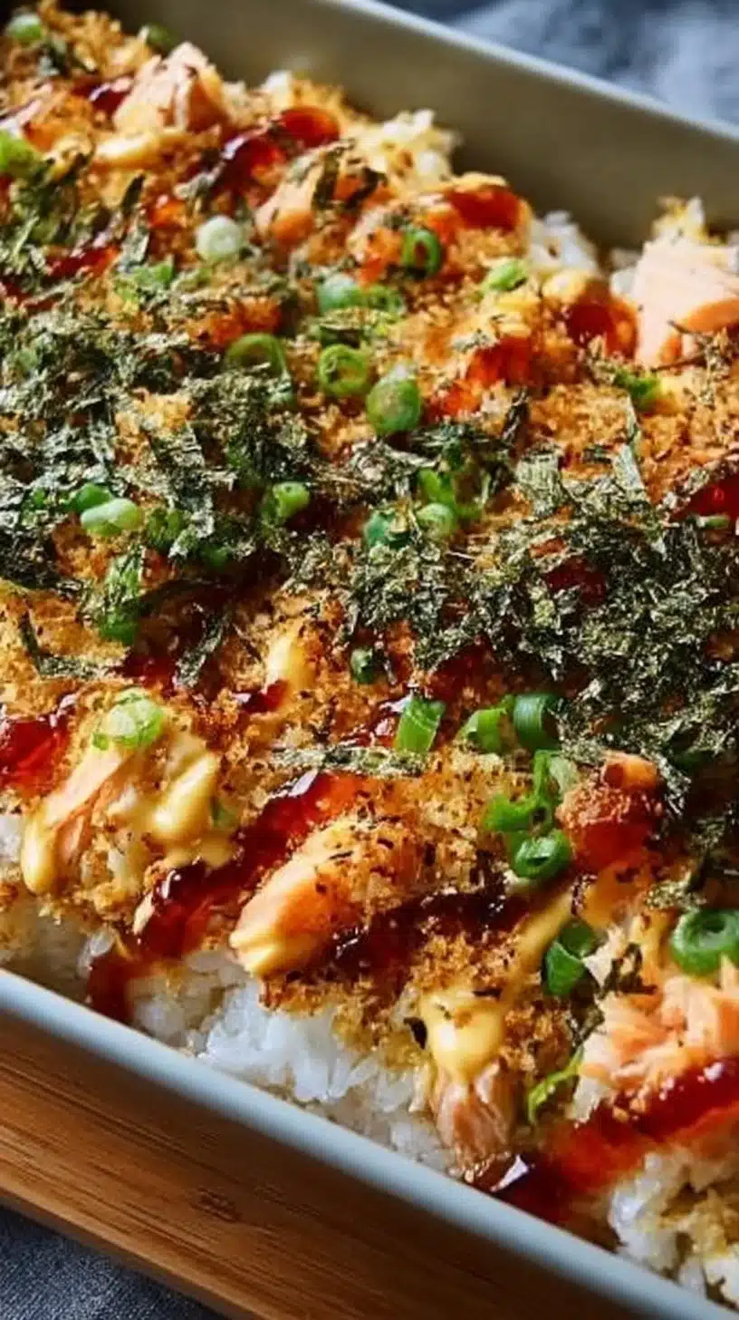 Sushi Bake 1 Delicious sushi bake dish served in a casserole dish, ideal for gatherings.