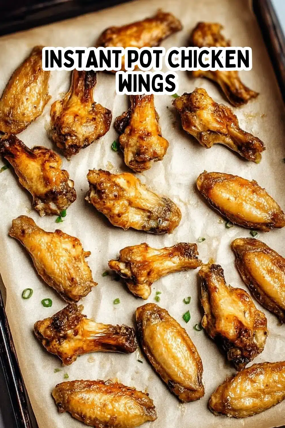 Delicious Instant Pot chicken wings garnished with herbs