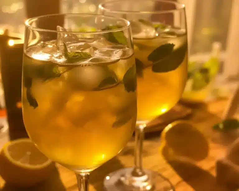 A refreshing glass of Saudi Champagne made with apple juice and sparkling water.